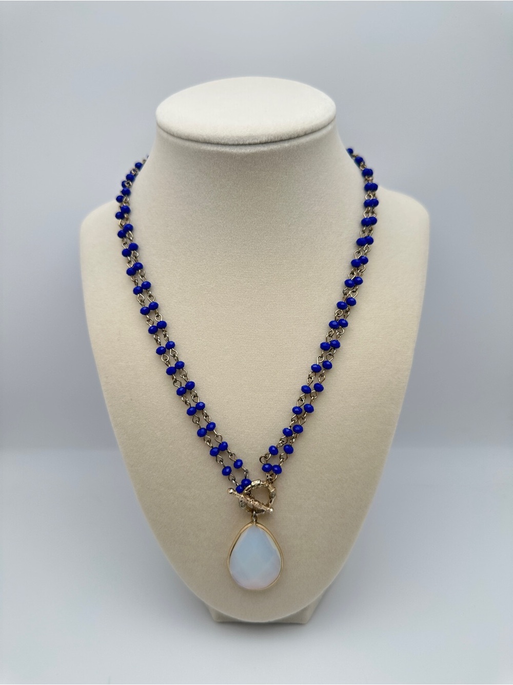 Gold Pendant Necklace with Blue Beaded Chain